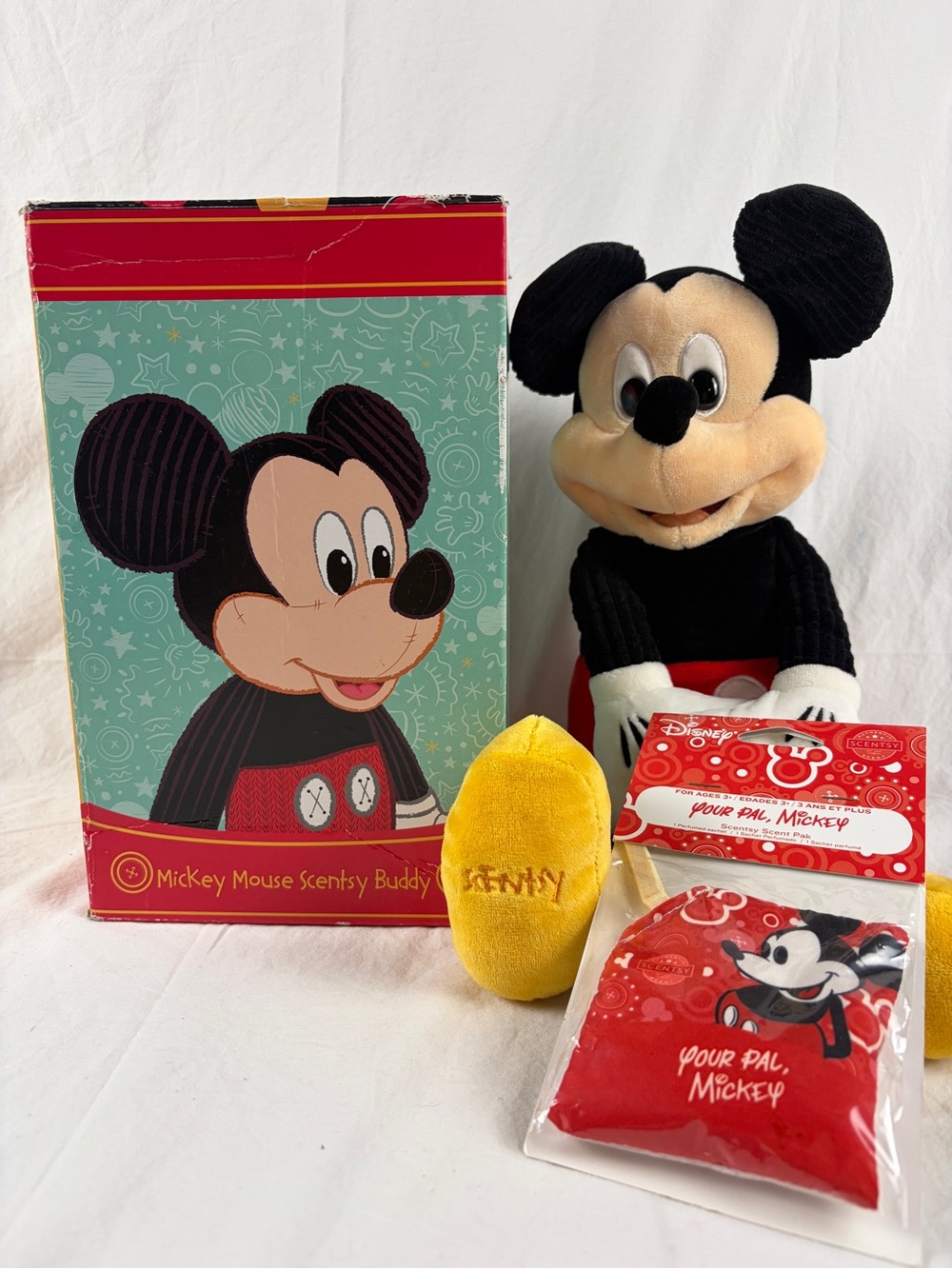 Unused/Open Box. Mickey is in new condition. Original sealed Sentsy sent pack